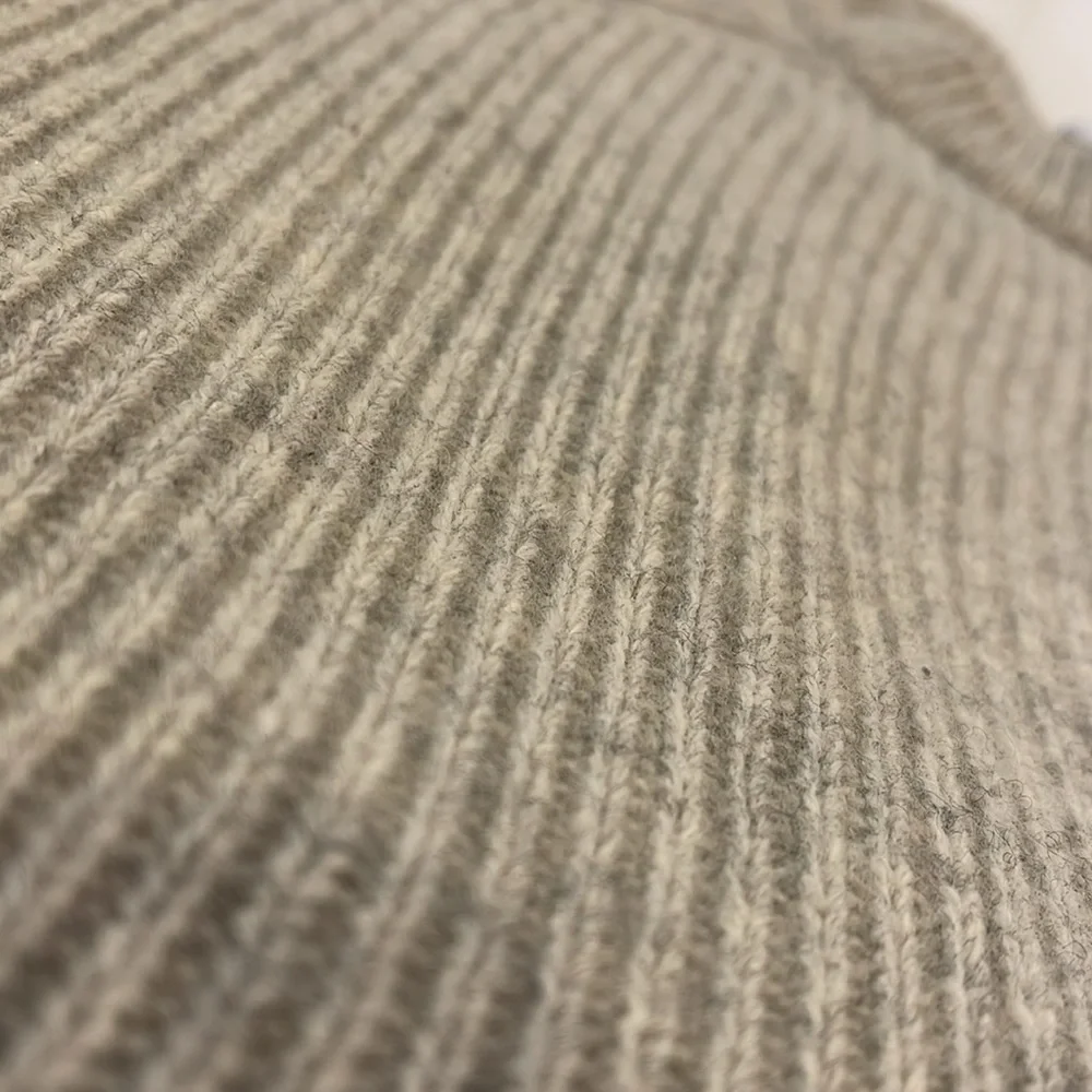 Gray crewneck sweater with lace up detail